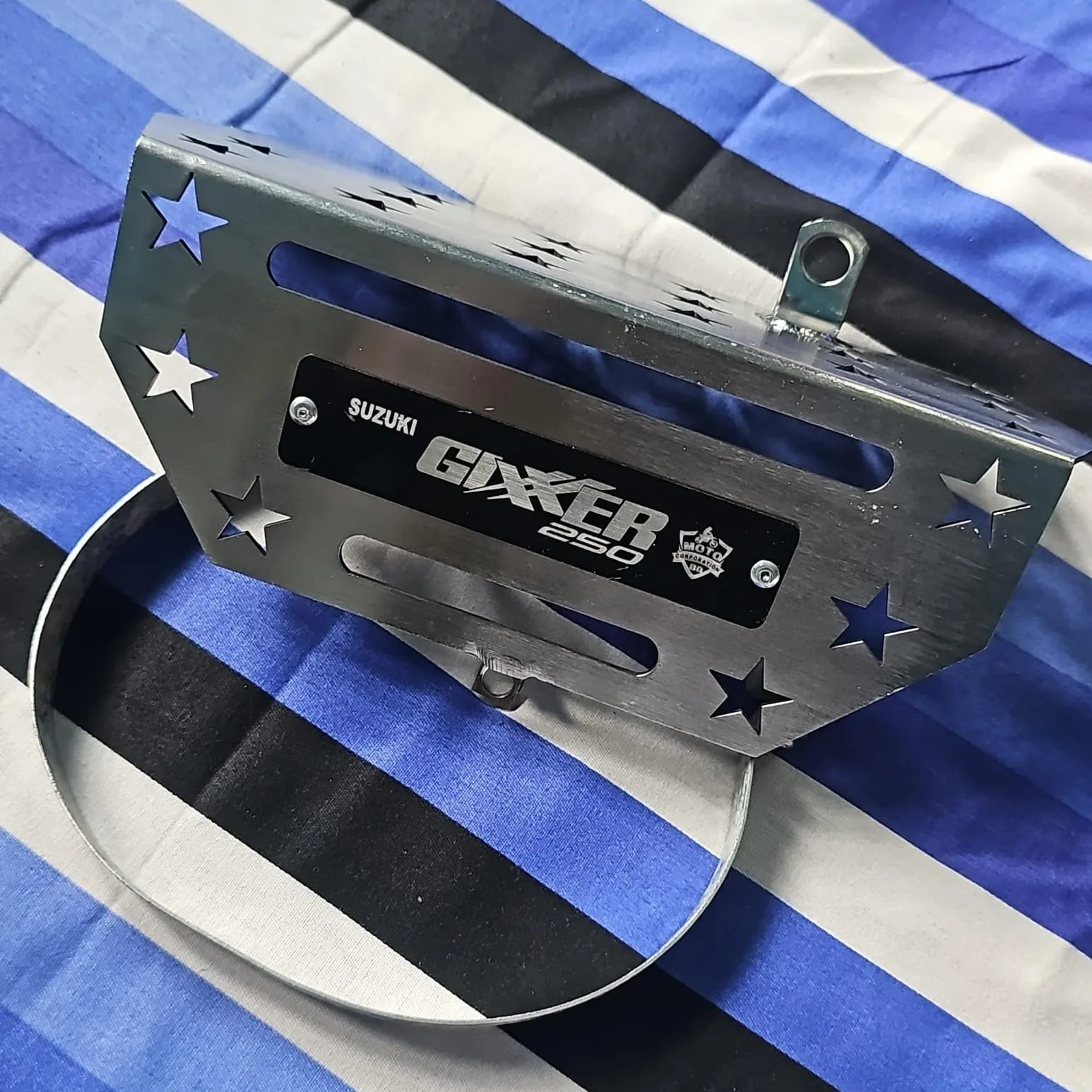 WhatsApp Image 2025-04-12 at 14.27.14_d57d565d SILENCER PROTECTOR SUZUKI GIXXER NAKED Fi ABS/GIXXER 250 PREMIUM - Image 1